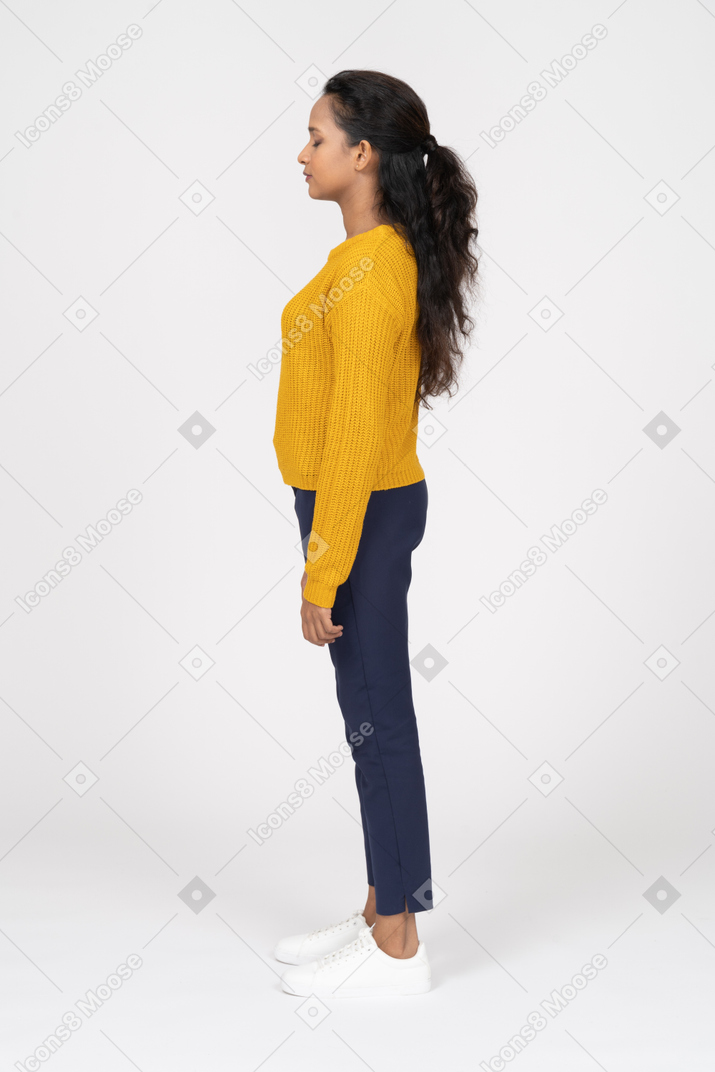 Side view of a girl in casual clothes