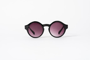 A pair of round shaped sunglasses