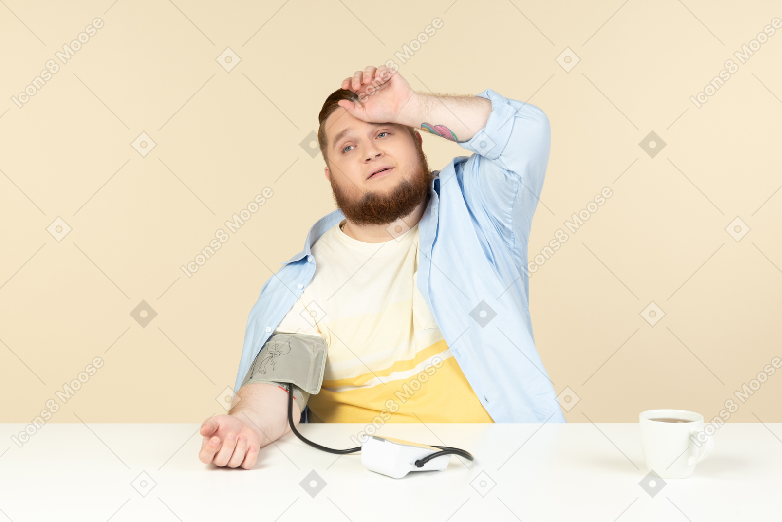 Sick looking young overweight man checking blood pressure