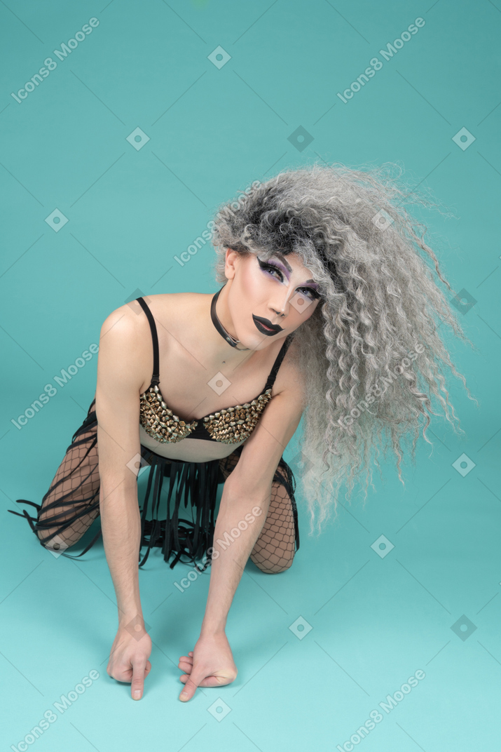 Drag queen standing on all fours