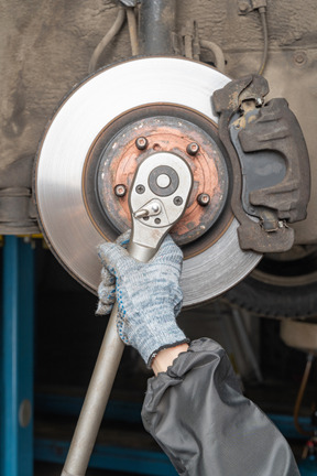 Human hand using wrench