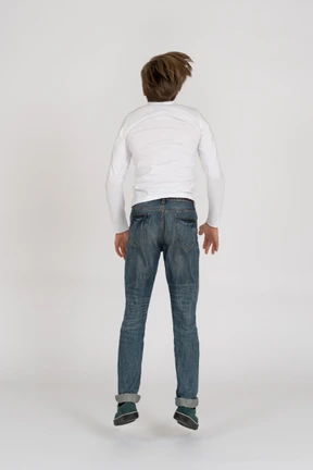Young man in casual clothes jumping