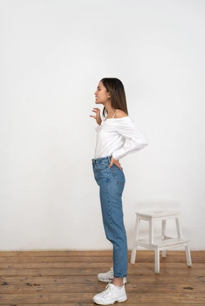 Side view of a woman making a scary face