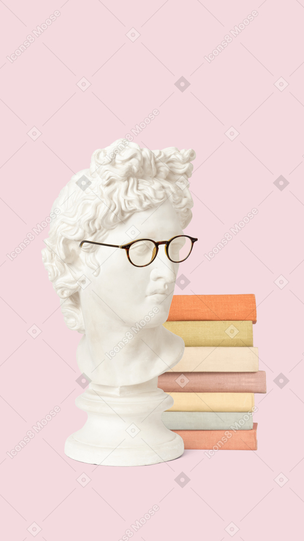 A white bust of a man with glasses next to a stack of books