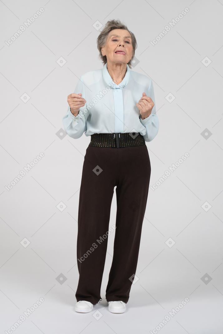 Front view of an old woman looking indecisive
