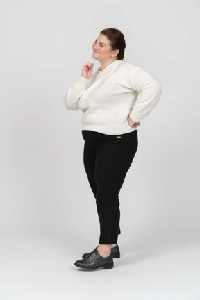 Happy plus size woman posing