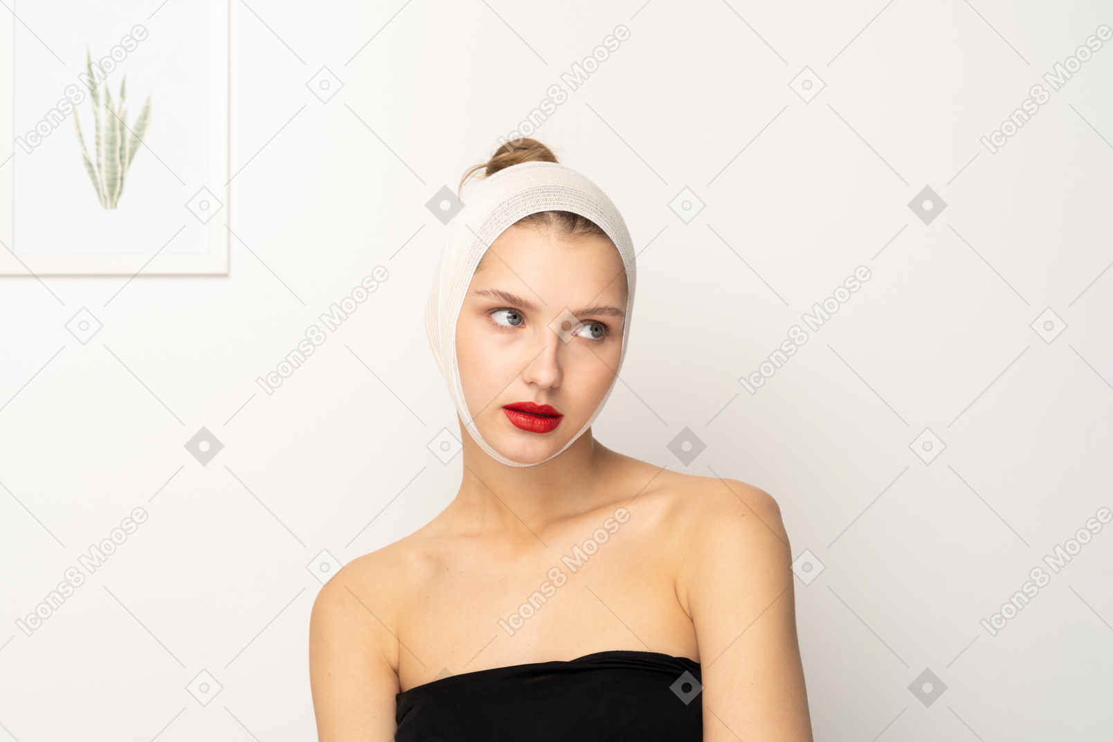 Portrait of a young woman with bandaged head