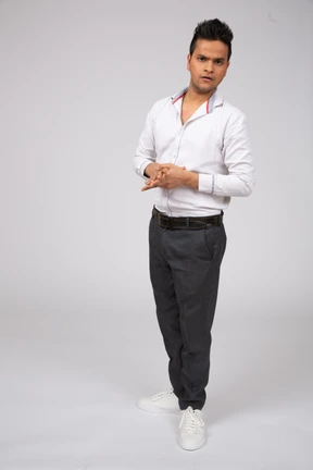Man in white shirt standing