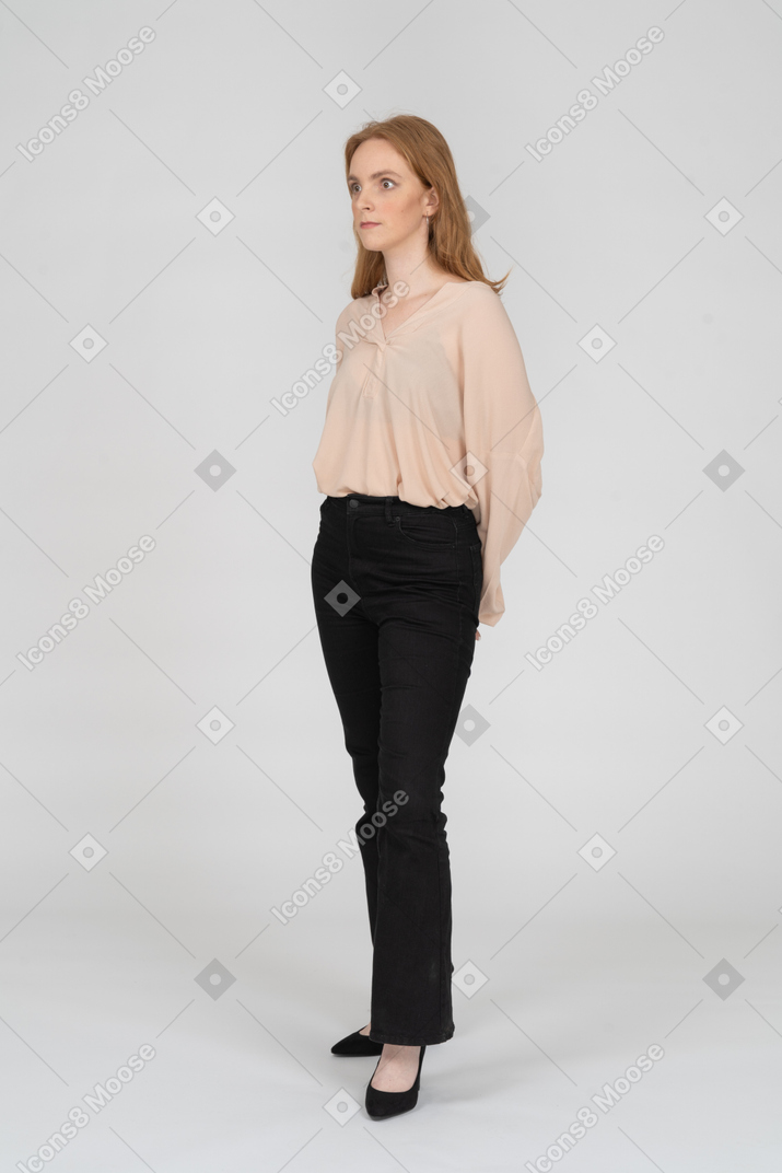 Woman in beautiful blouse standing