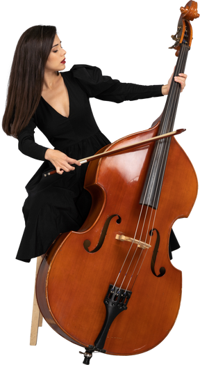 Front view of a young lady sitting on a chair while playing double-bass with a bow