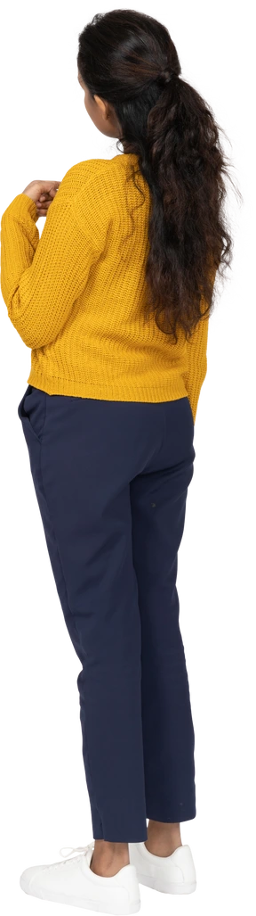 Rear view of a girl in casual clothes pointing at herself
