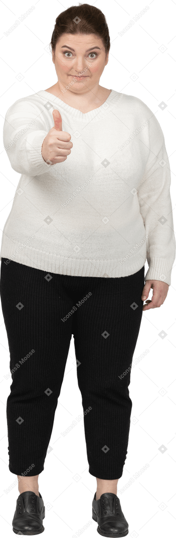 Happy woman in white sweater showing thumb up