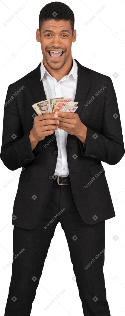 Three-quarter view of a young man in black suit holding banknotes