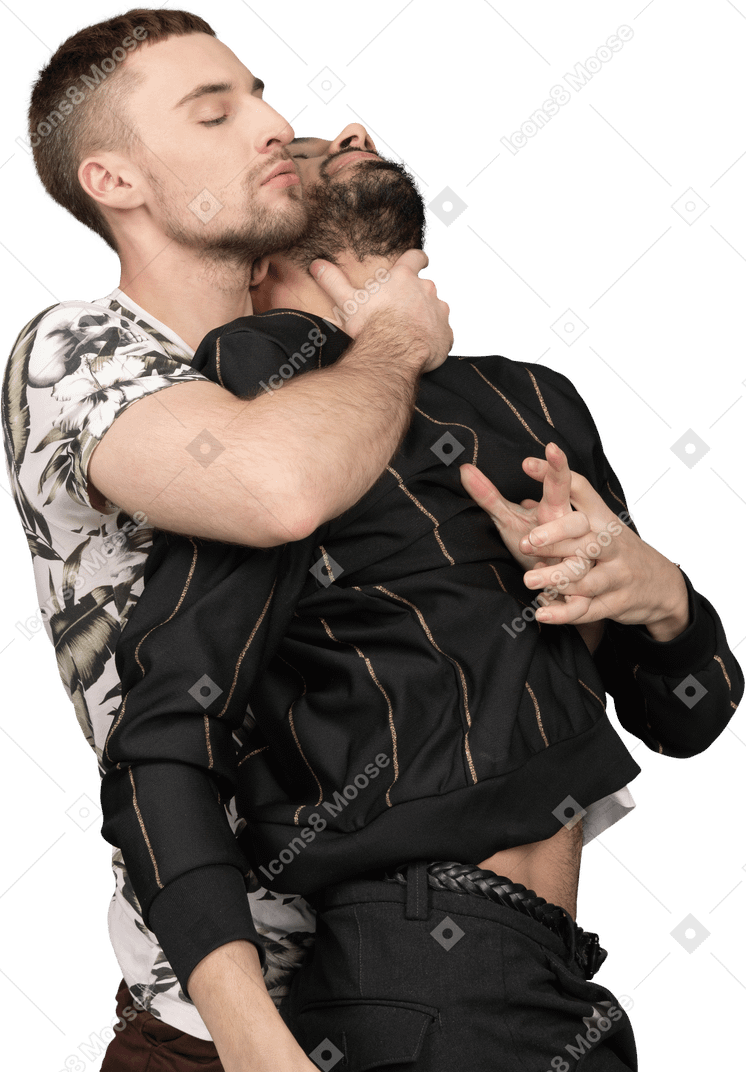 Young caucasian man hugging his partner sensually from the back with a hand on his neck
