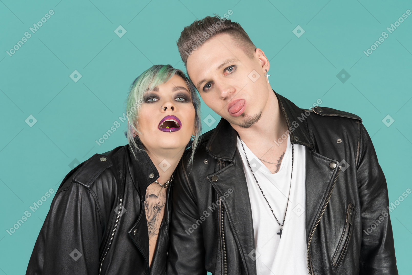 Punk couple showing tongues and making faces
