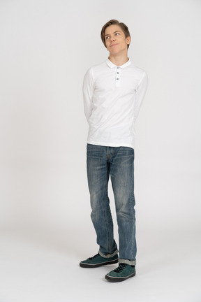 Young man in casual clothes standing