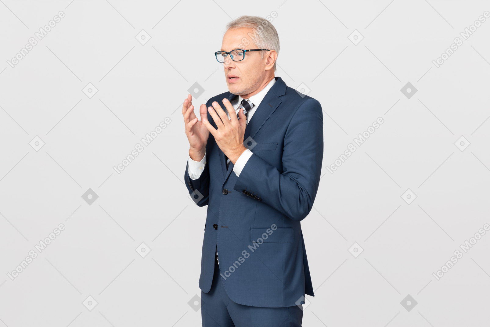 Mature businessman looking shocked with something