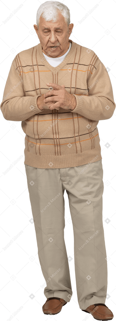 Front view of a sad old man in casual clothes