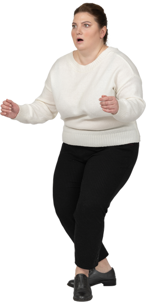 Frightened plus size woman in casual clothes