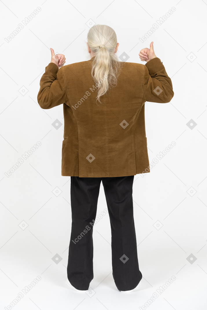 Vista traseira de um homem idoso mostrando os polegares