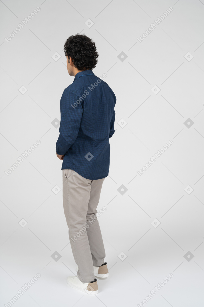 Rear view of a man in casual clothes