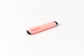 Pink colorful pen on white background