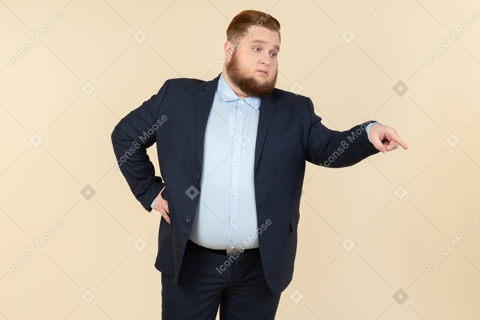 Unsatisfied young overweight man in suit pointing