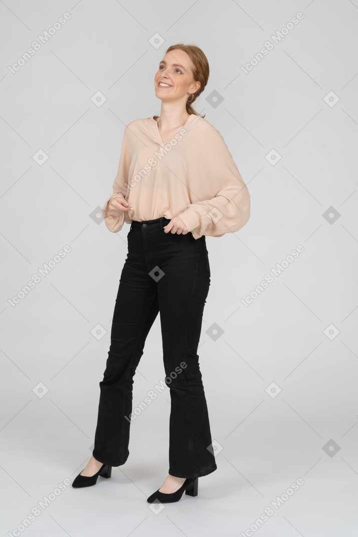 Woman in beaufitul blouse standing