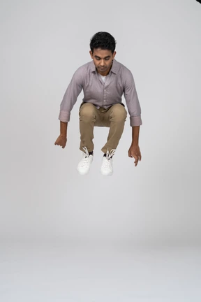 Man in casual clothes jumping