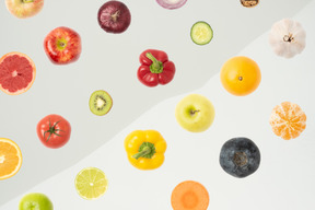 A group of fruits and vegetables on a white background