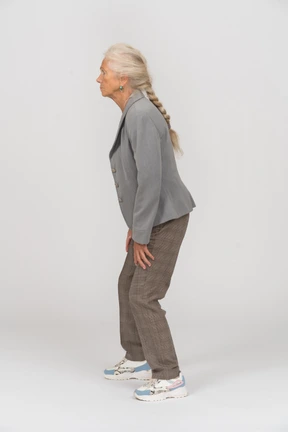 Old lady in suit posing in profile