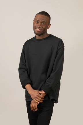 Humble young man lookinng at camera