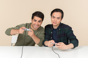 Interracial friends playing video game