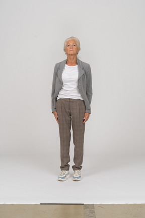 Front view of an old lady in suit