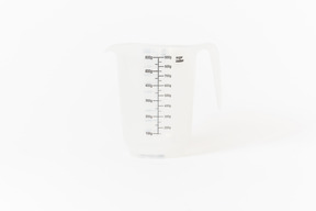 Plastic measuring cup with a scale