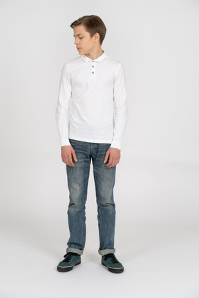 Young man in casual clothes standing