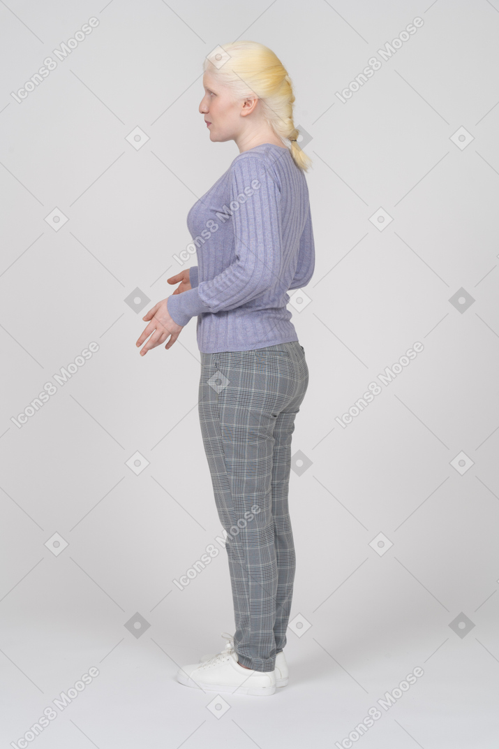 Side view of bending hands young woman