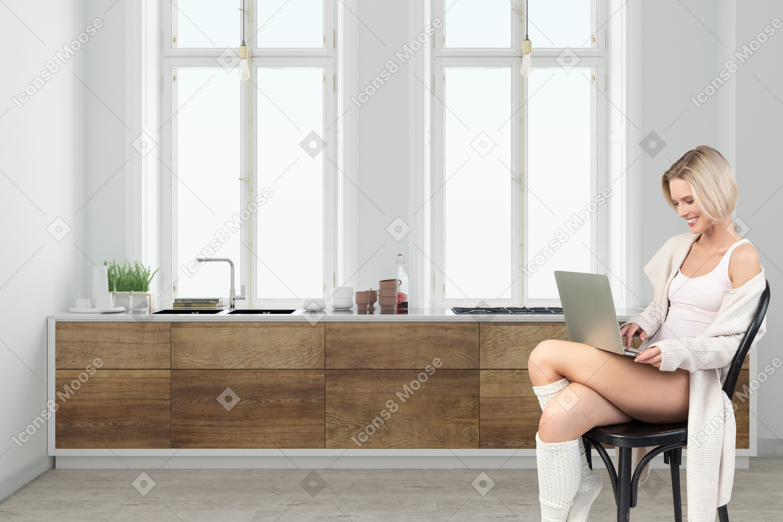 Woman sitting on a chair using a laptop
