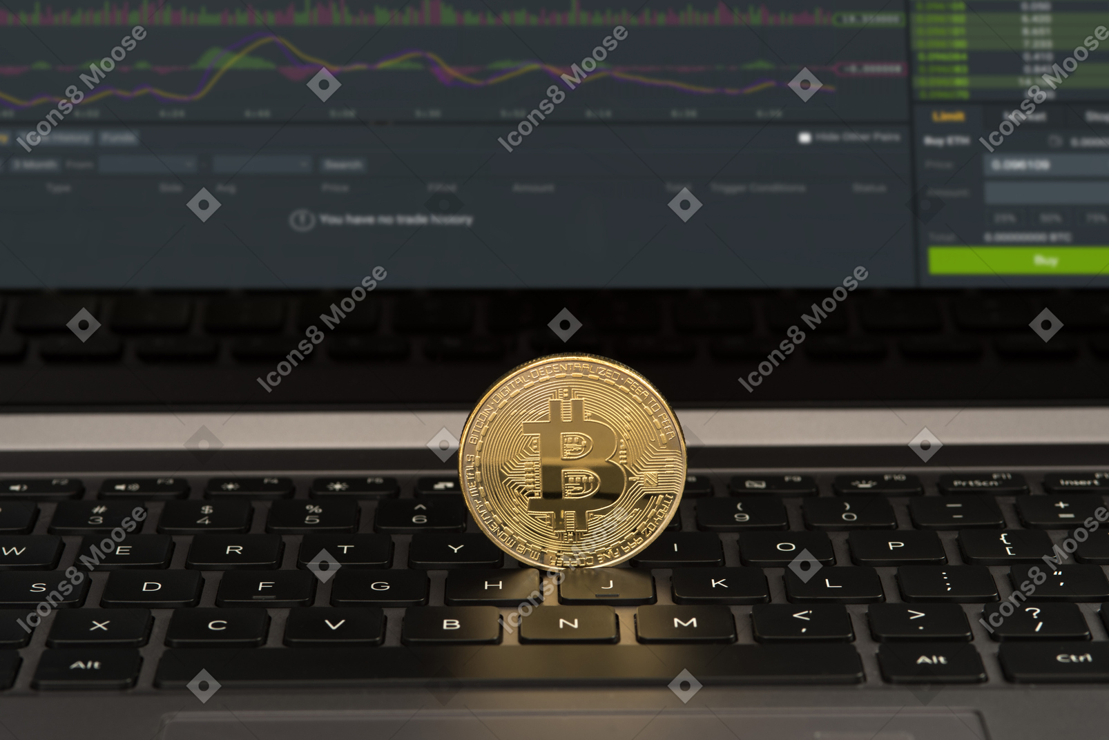 Bitcoin on laptop keyboard