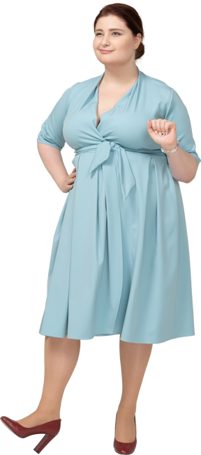 Front view of a woman in blue dress
