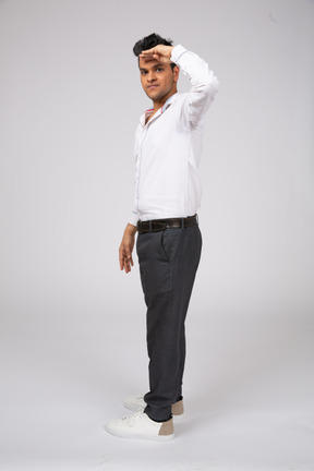 Man in white shirt standing