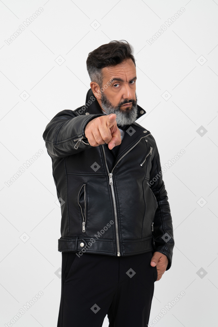 Confident handsome mature man pointing at something