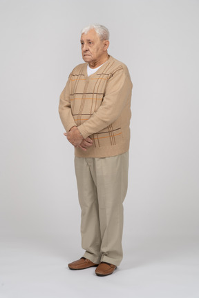 Front view of an old man in casual clothes