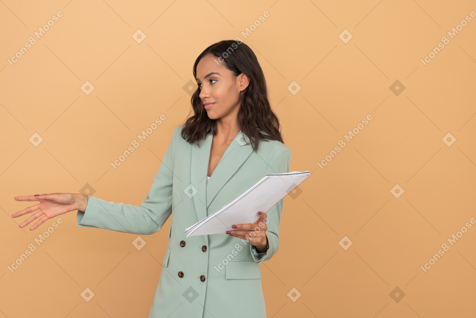 Astonished young woman holding a bunch of papers