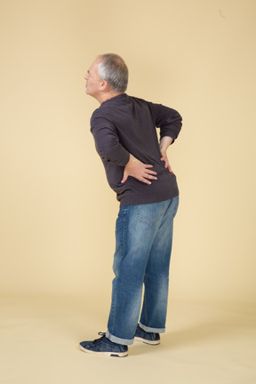 Man in casual clothes posing