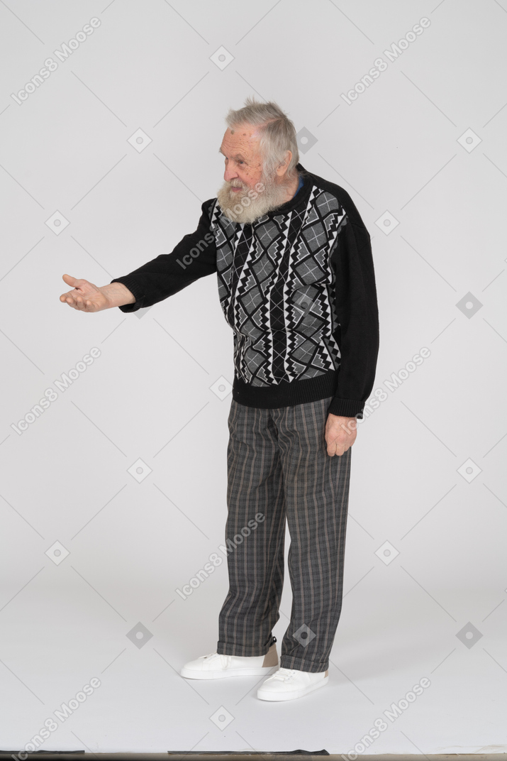 Old man gesturing with hand outstretched