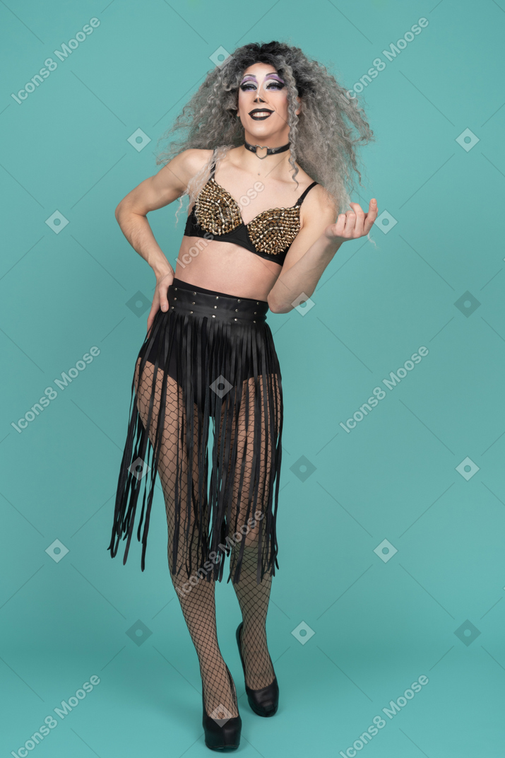 Drag queen smiling with hand on hip