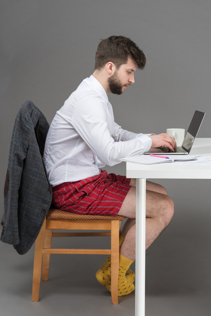 Elegant worker at home office during isolation period