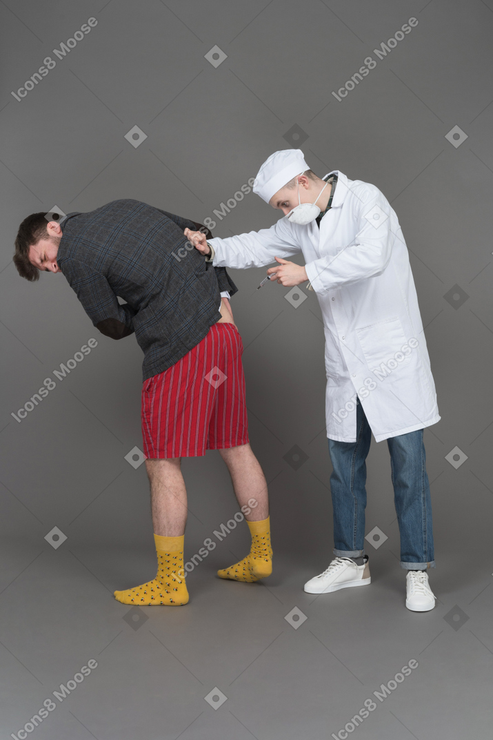 Doctor making an injection
