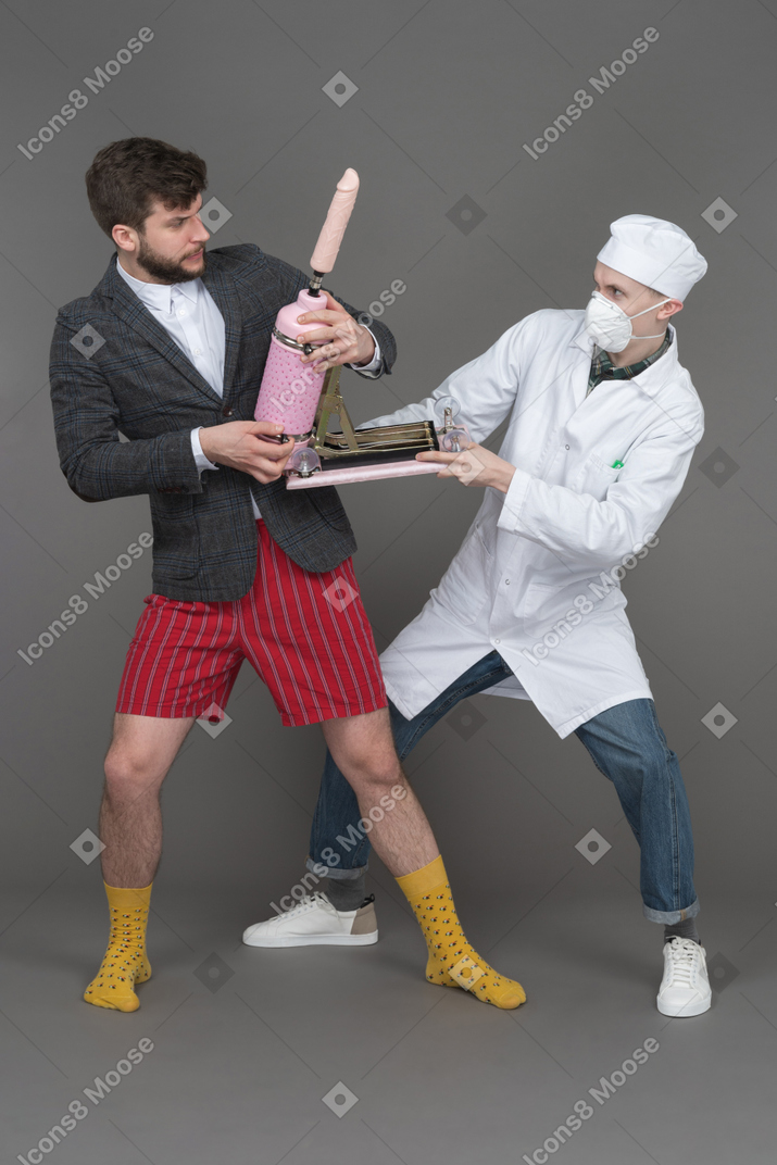 Young man and doctor fighting